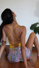 Solid Tumeric Eternity Tie Dye Bodysuit